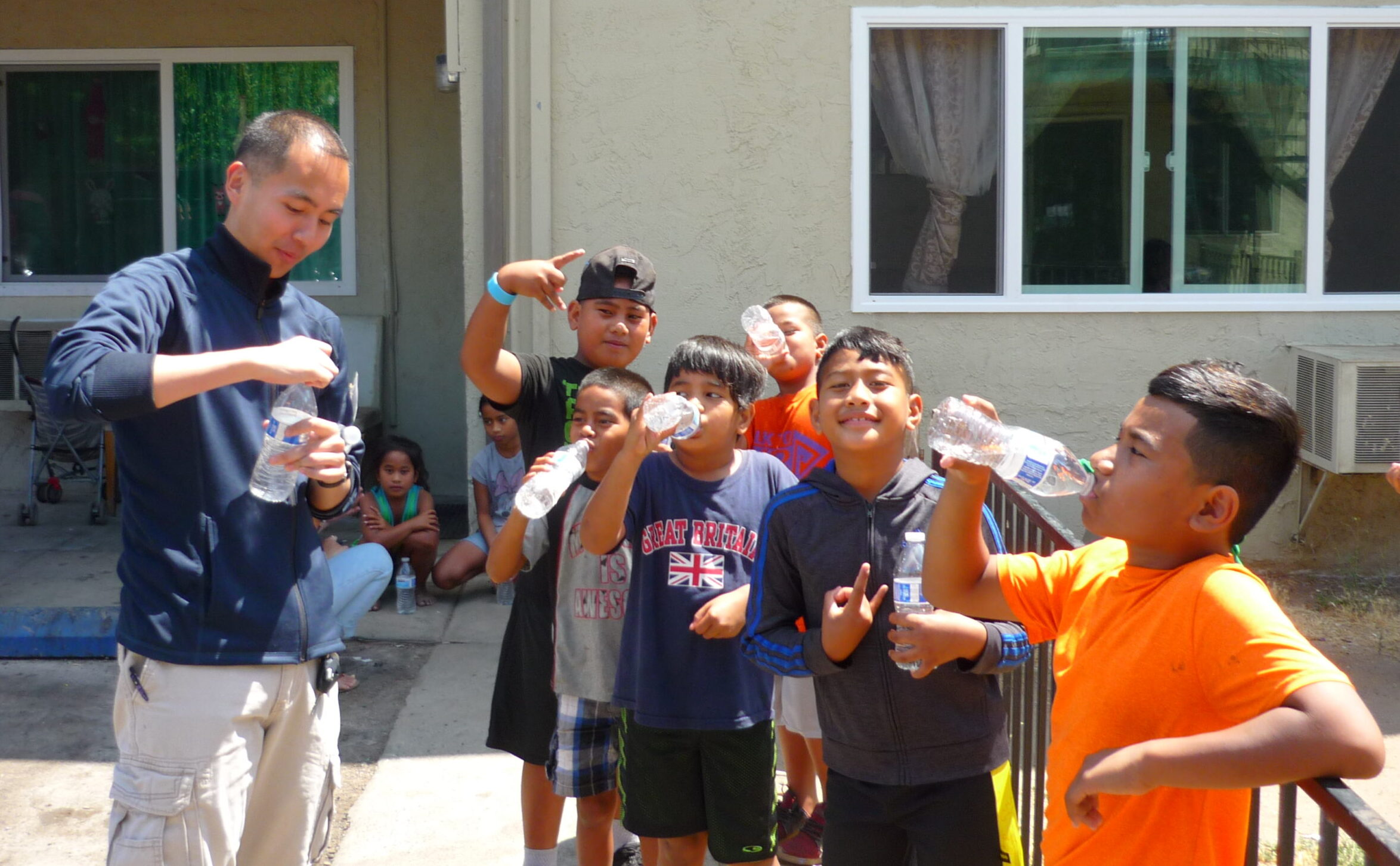 CCMP volunteer doctor teaching importance of hydration