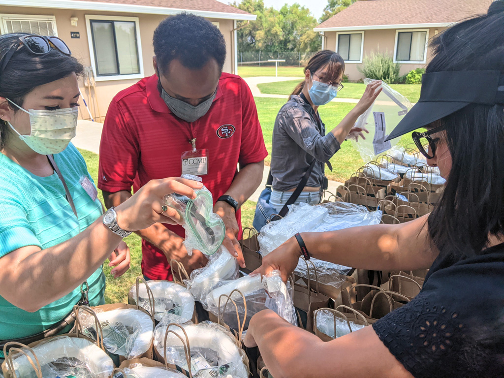 CCMP member doctors on distribution at labor camp